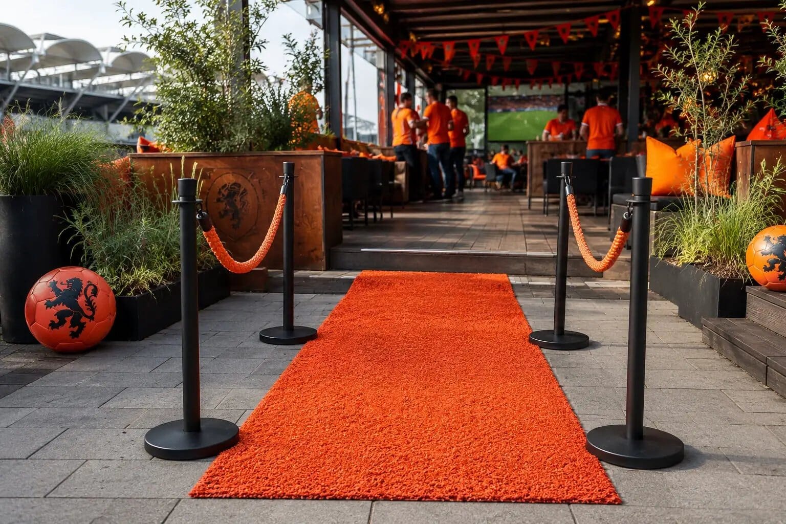 WK Oranje Leeuwen Bundel Outdoor Premium orange carpet walkway with black stanchions and decor